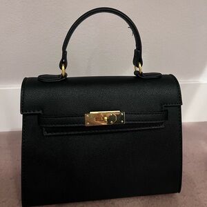 Women's Black Satchel Handbag with Gold Hardware